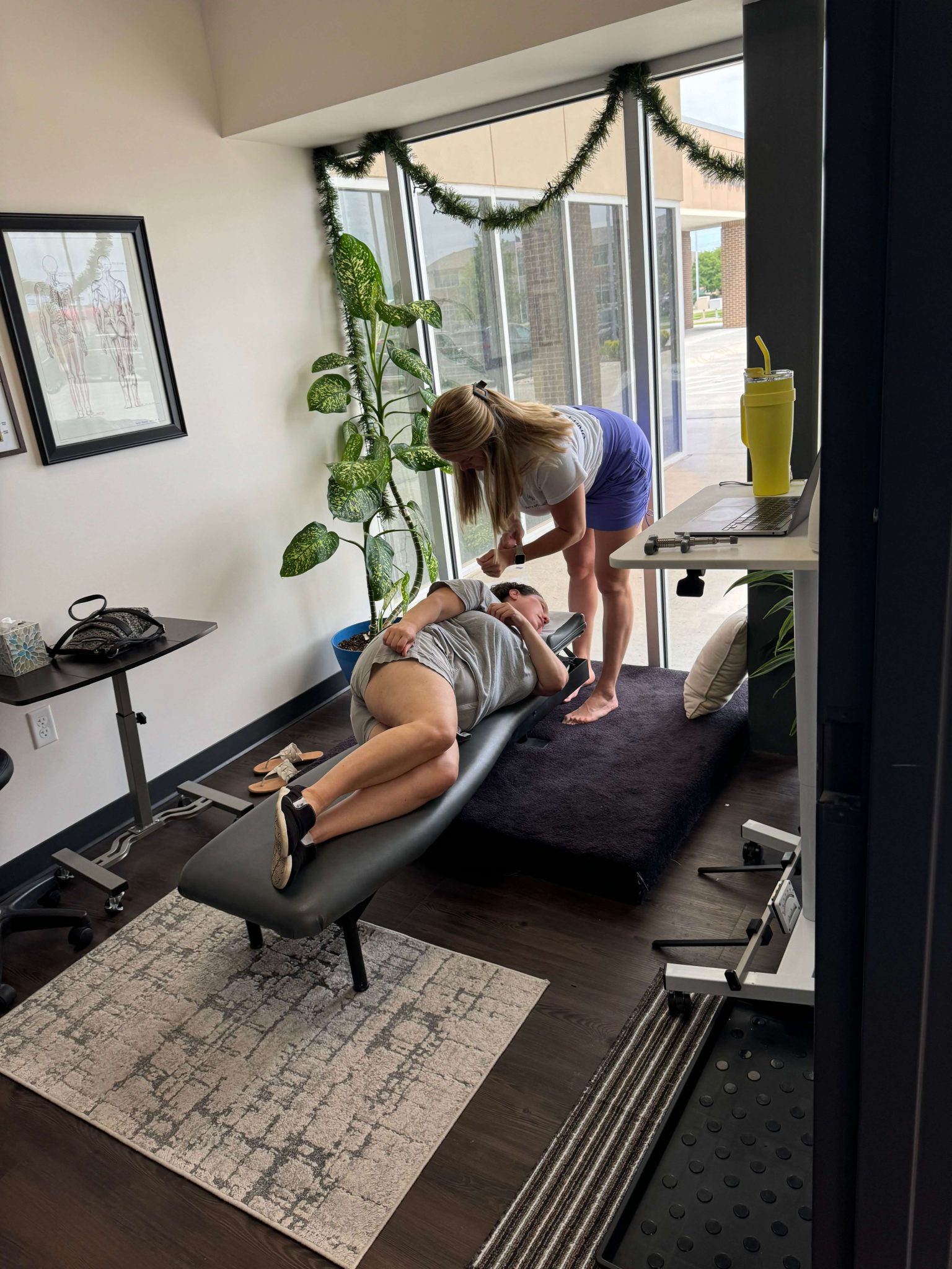 Dr. Danielle Stalp adjusting a patient using upper cervical care