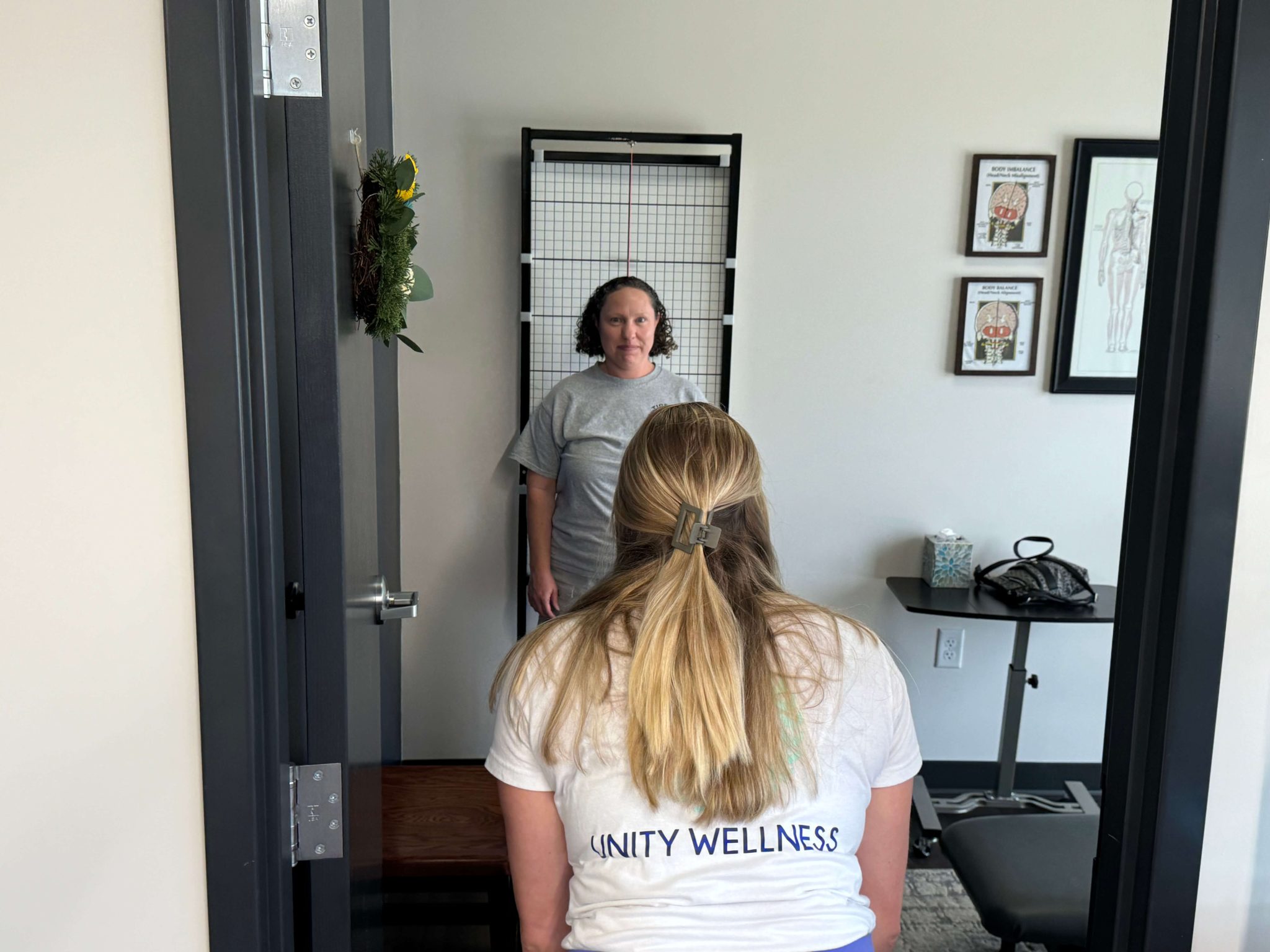 Dr. Danielle Stalp examining a patient using upper cervical care